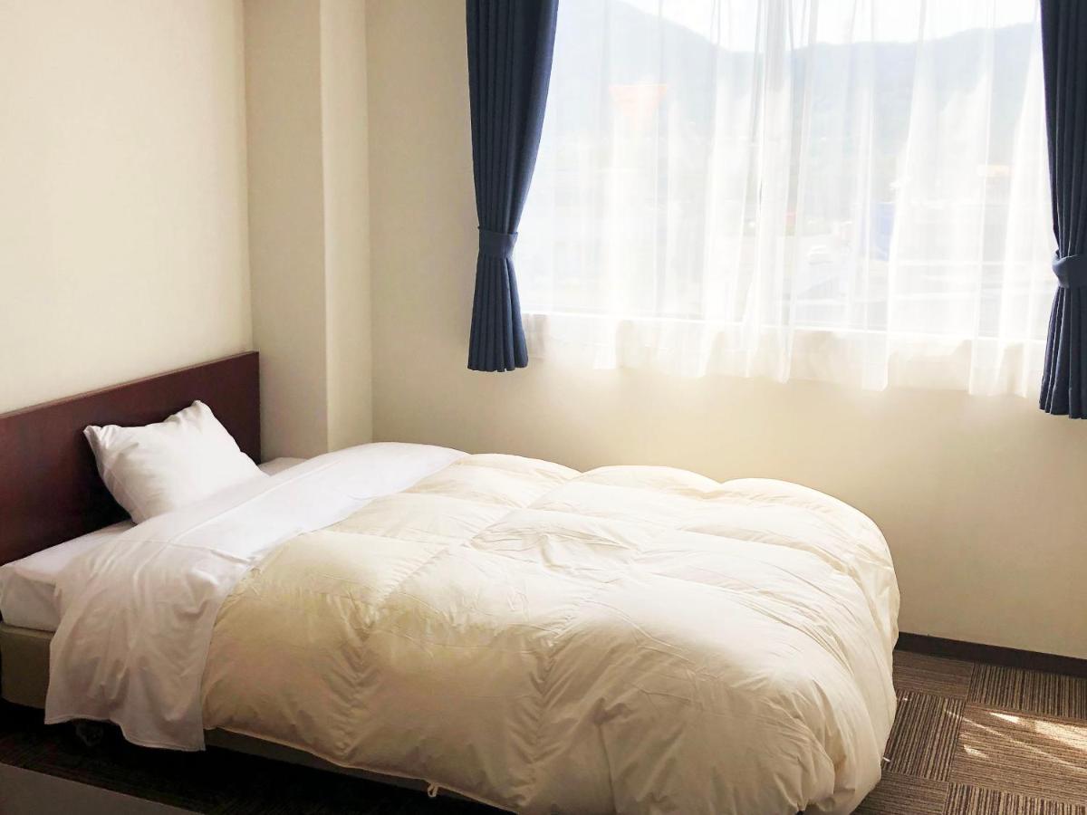 Business Hotel Fujimi Fujiyoshida Bagian luar foto